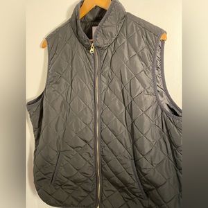 Black vest with gold zipper